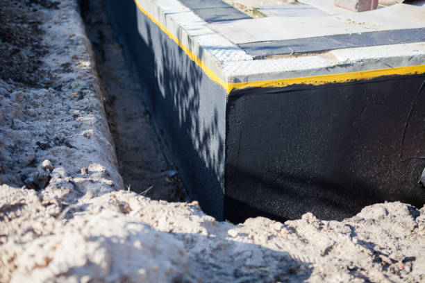 Professional Waterproofing technician working in Westlake, OH